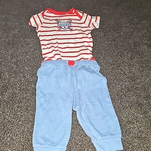 9 month outfit. Short sleeved onesie with drawstring pants. Baseball themed.